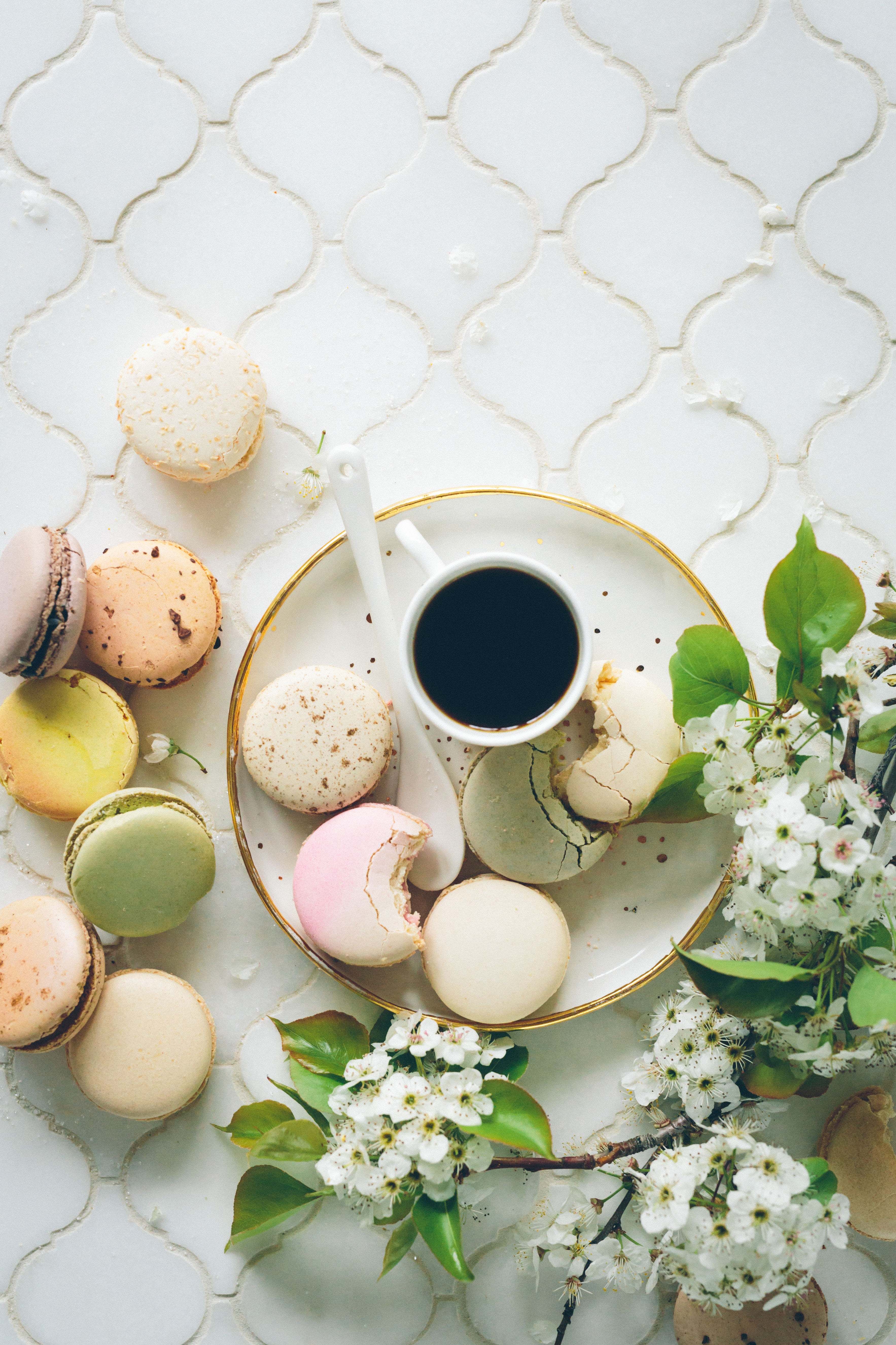 Macarons with coffee cup. Top view free stock photo