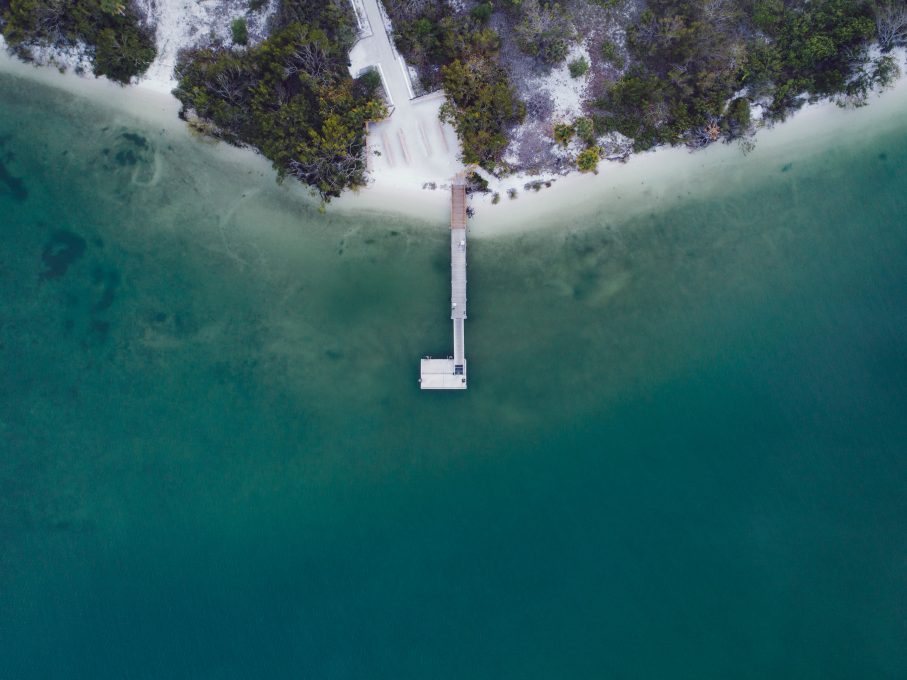 Aerial photography of a dock on body of water