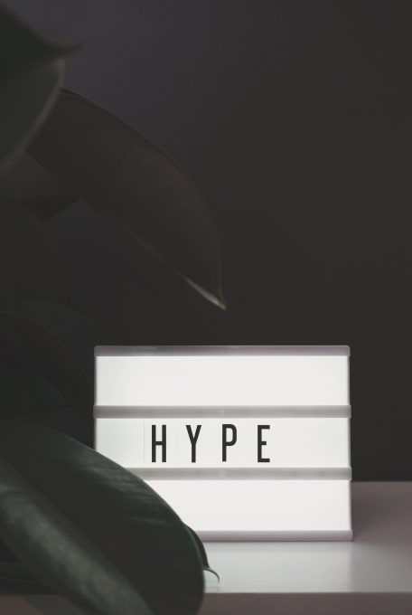 Grayscale photography of hype sign