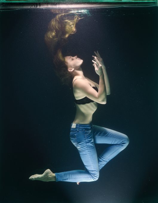A woman in the body of water