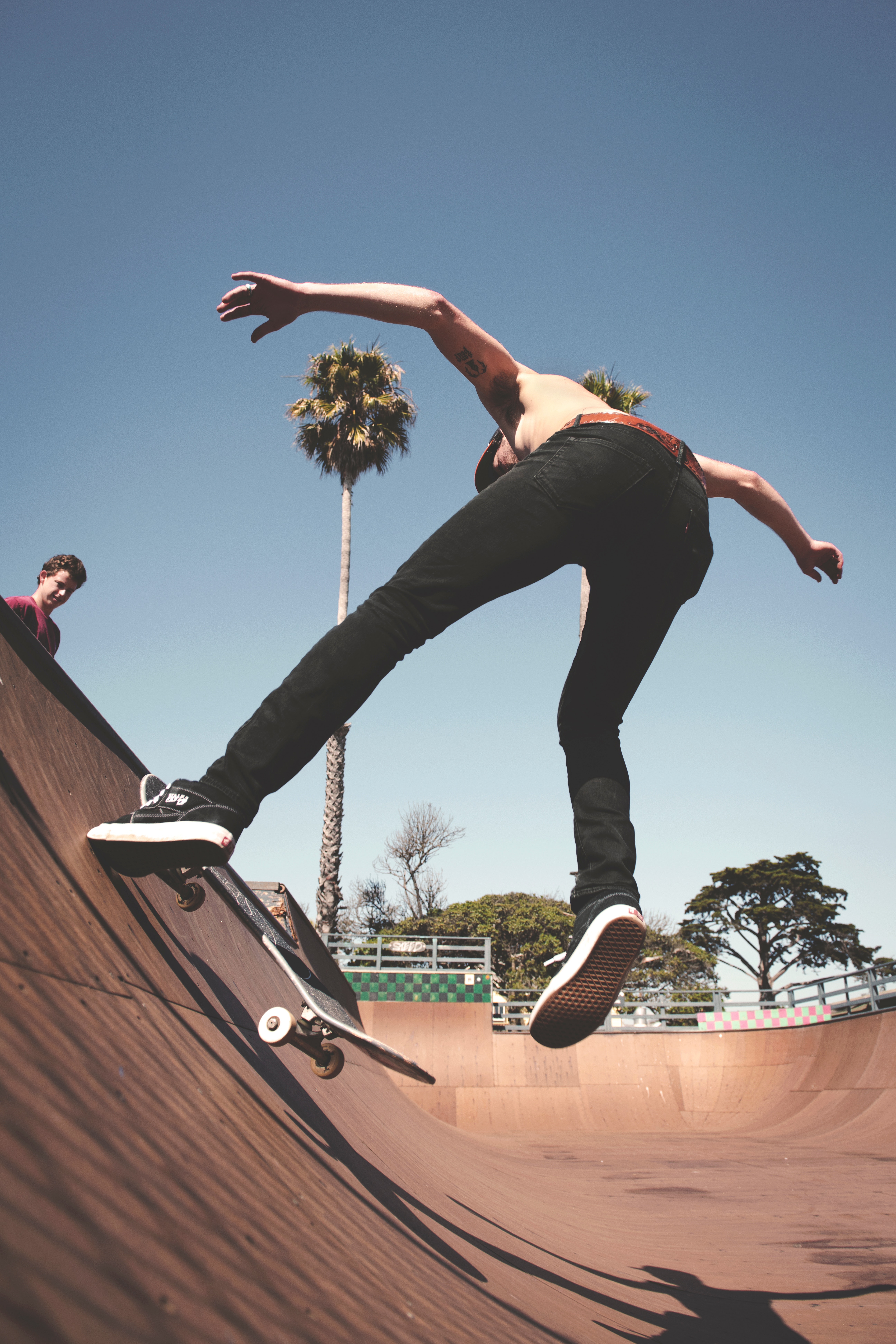 Low angle photo of a person skateboarding