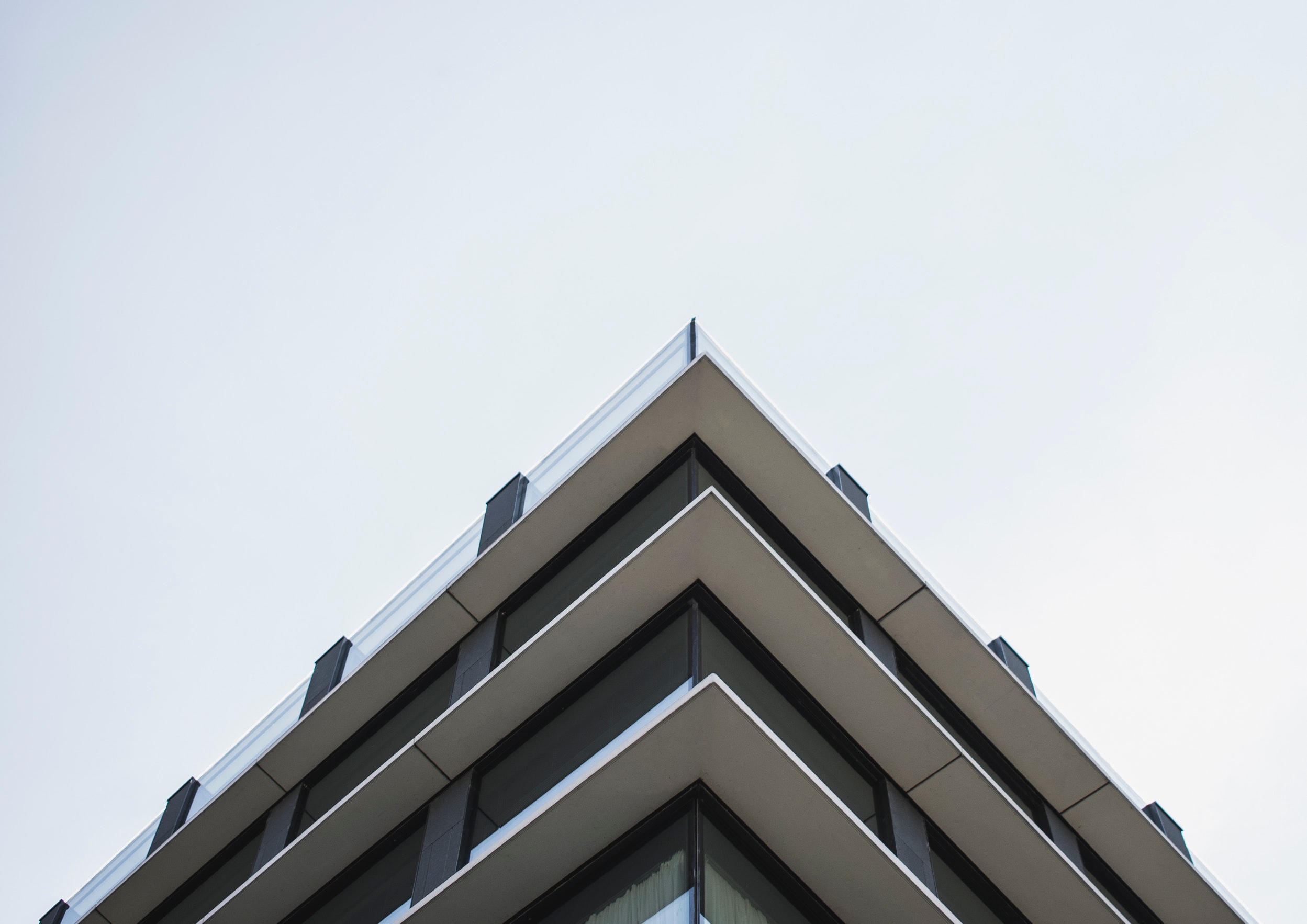 Low angle photo of a white concrete building
