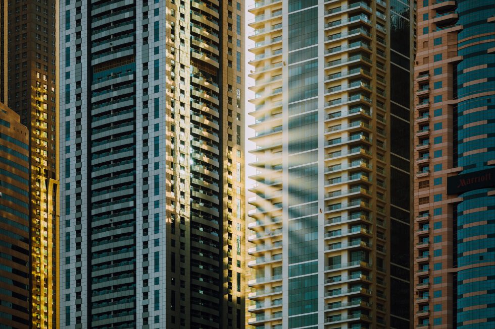 Aerial photography of sun rays on glass curtain buildings