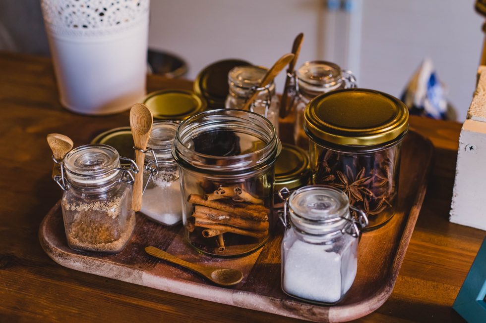 Clear glass jars on top of a tray