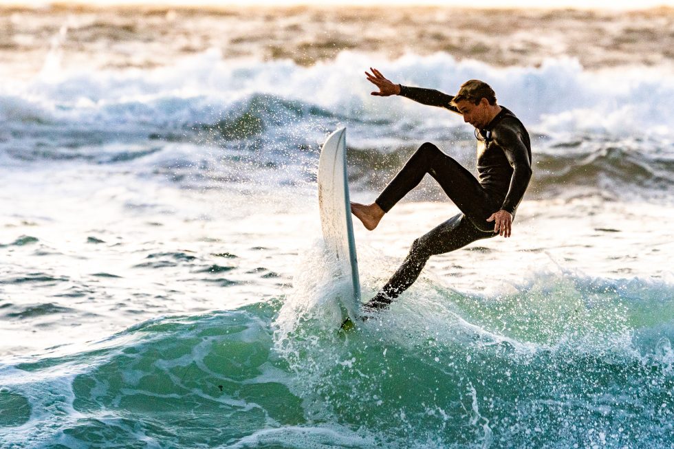 A surfer performing tricks