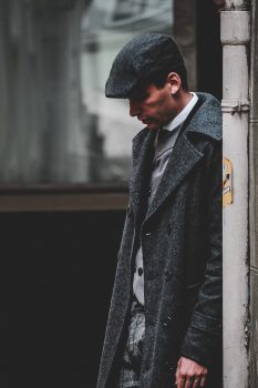 A man in a gray coat