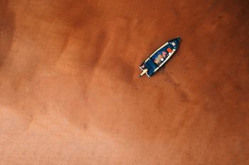 Bird's eye view of a boat on the seashore