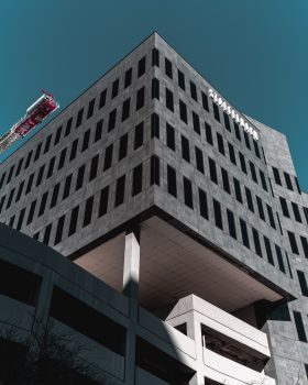 Low-angle photo of a black concrete building