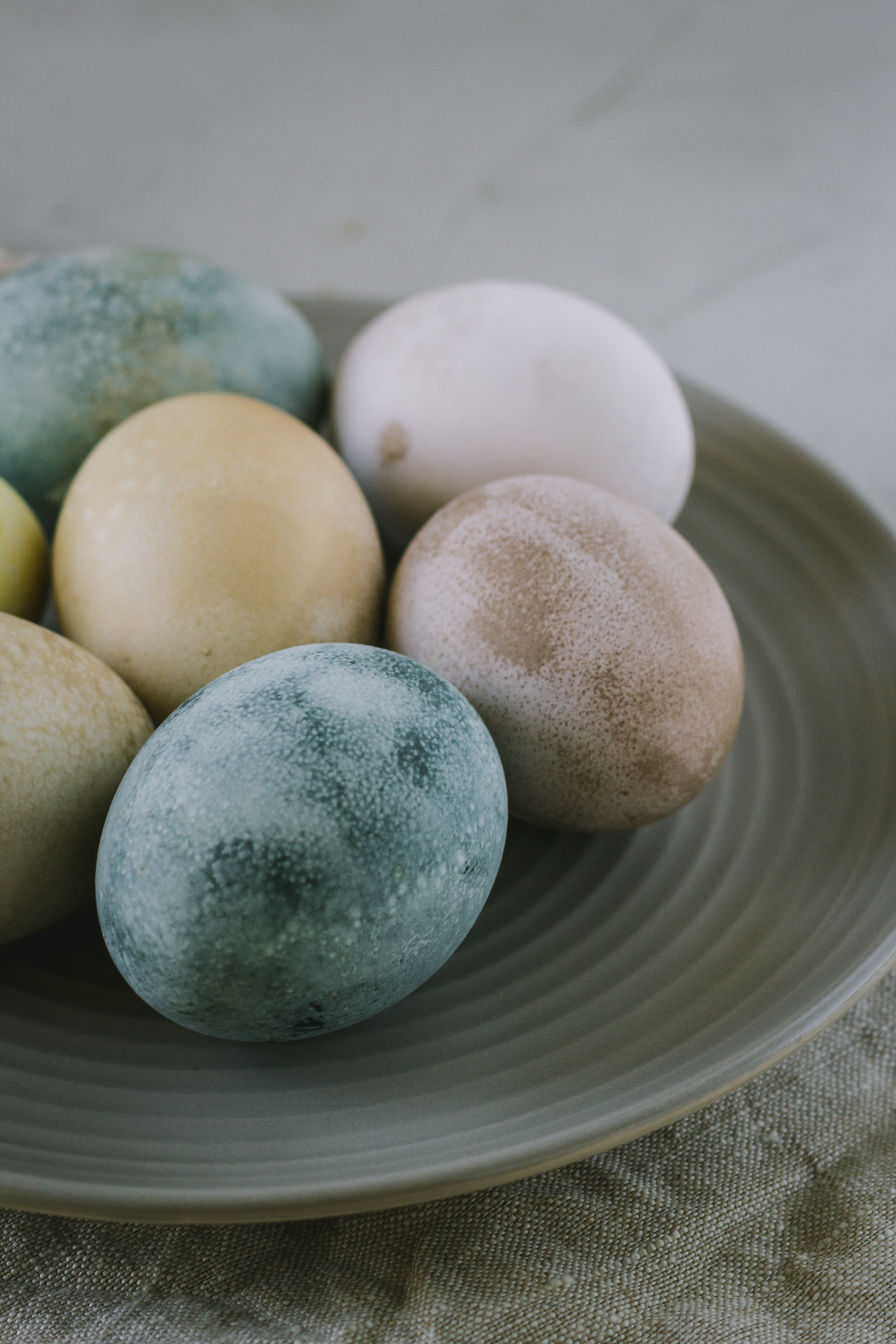 Assorted-color Easter eggs on a plate