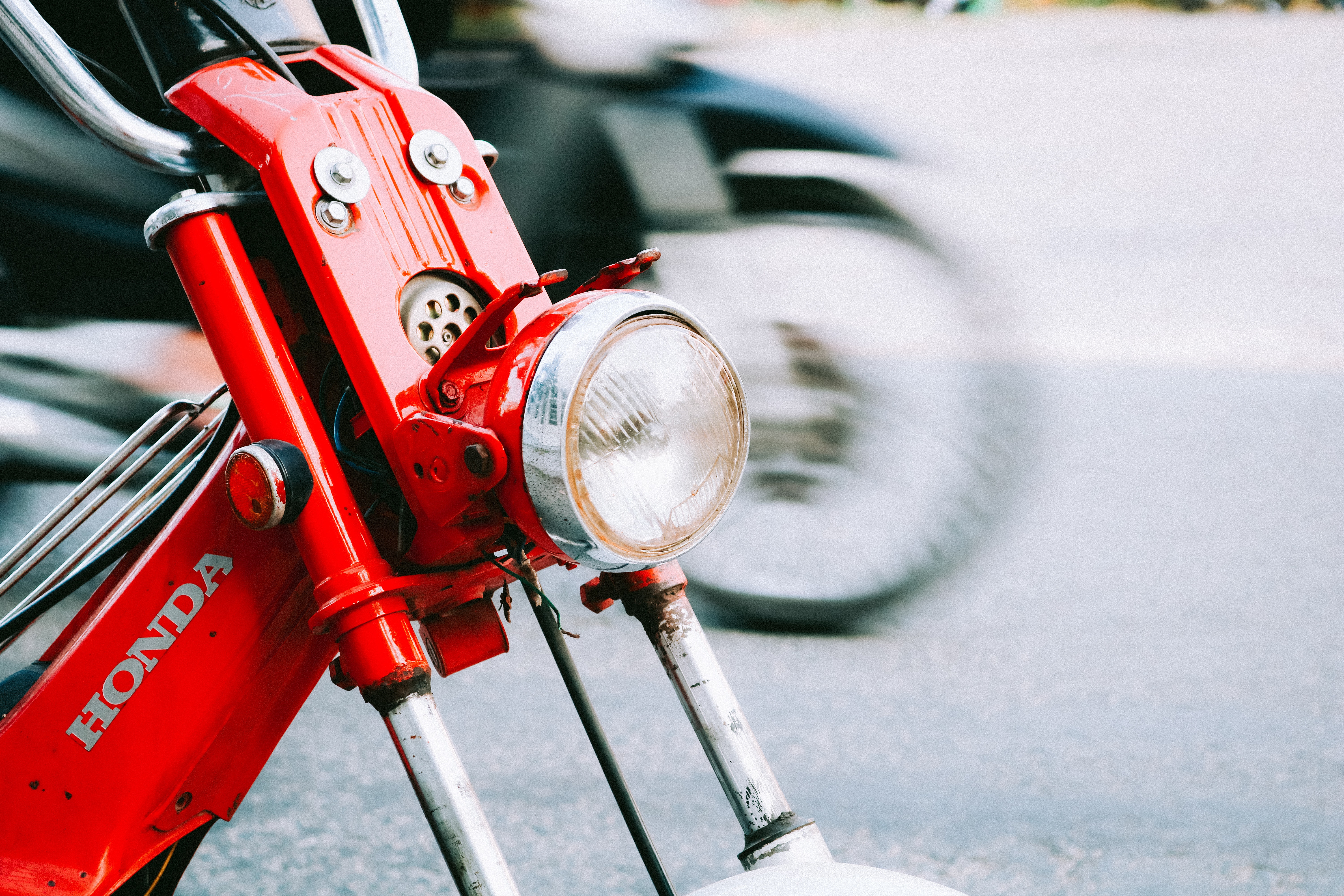 Close-up photo of a red motorcycle