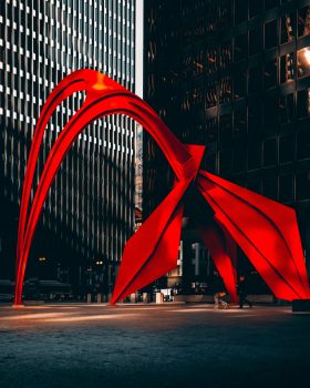 Selective-color photography of a red outdoor art