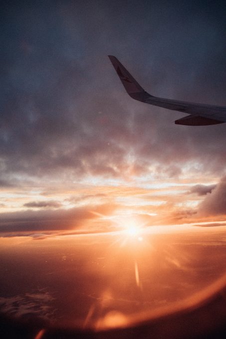 Sunset seen through an aircraft's window while on flight