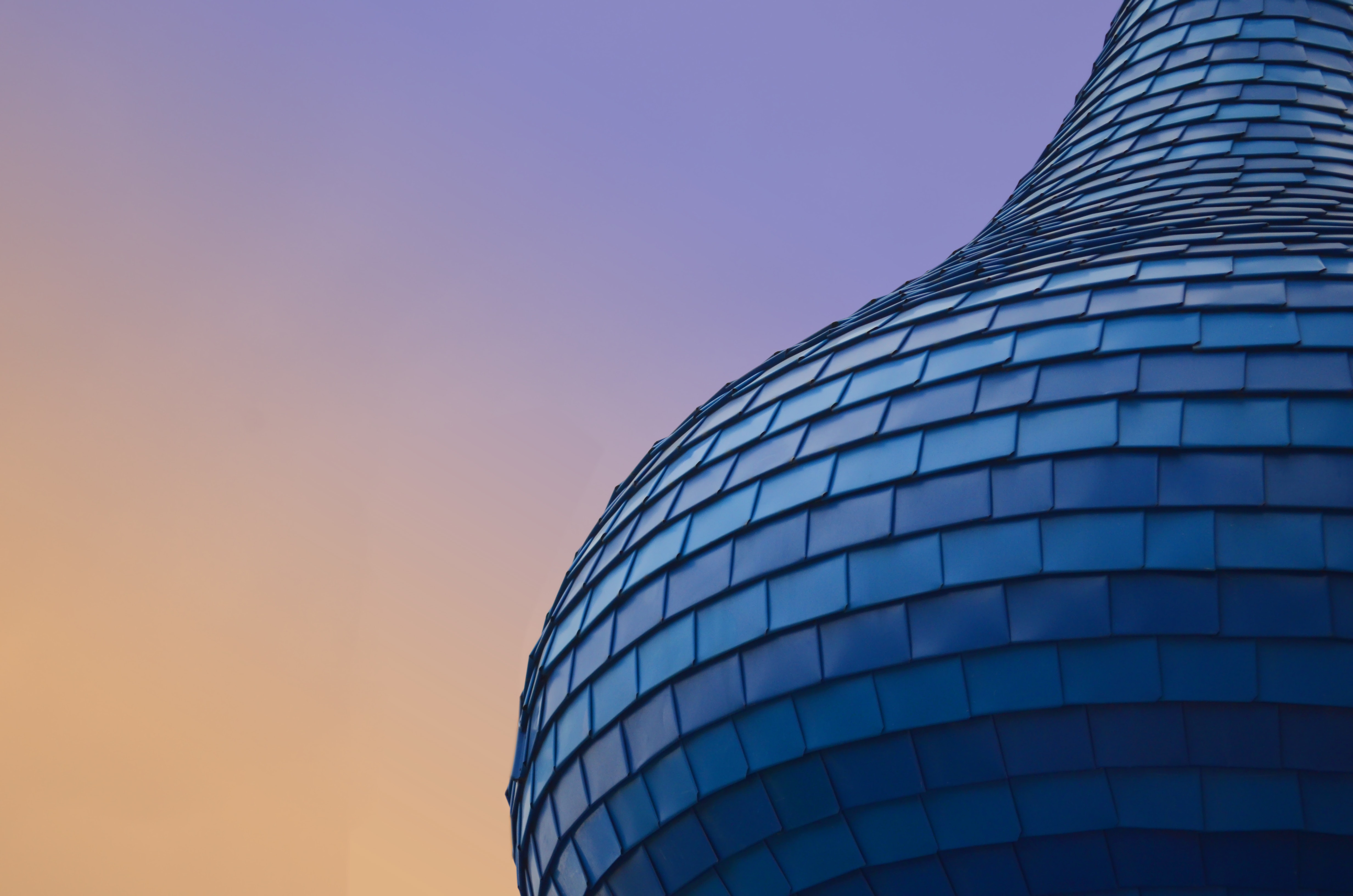 Close-up photo of a building during purple sunset