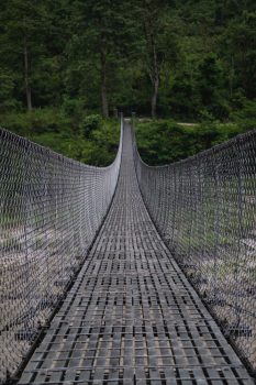 Close-up photography of a gray bridge